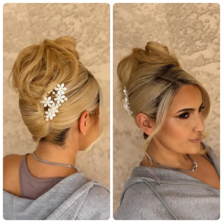 Bride with voluminous blonde updo and decorative pearl flower hair accessory