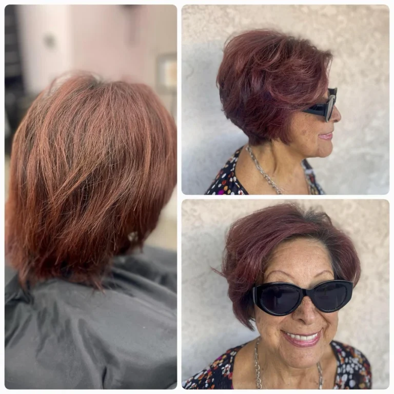 Smiling mature woman after her stunning Dettycated haircut and color refresh, featuring a soft burgundy shade with elegant volume and definition.